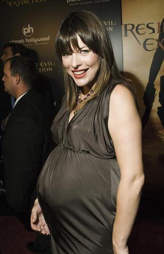 Milla Jovovich VERY pregnant