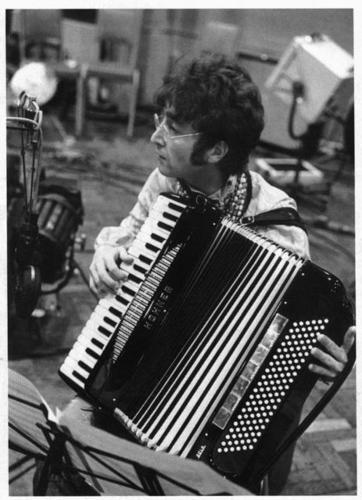  John Lennon plays the accordion