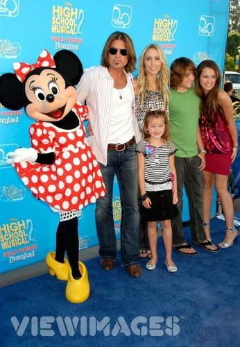 Family and Minnie Mouse