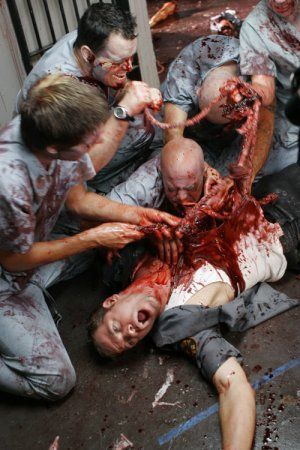 Prison Inmate devoured by fellow zombie inmates