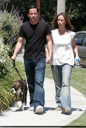 Jennifer & Ross walking their dog