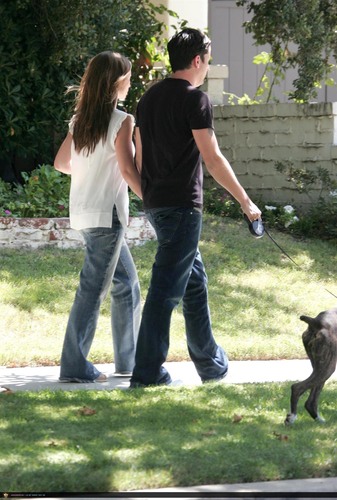 Jennifer & Ross walking their dog