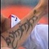 Fernando Torres with tribal tattoos images on the left arm