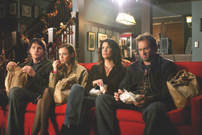  Who spilled the beans to Lorelai about Rory's first kiss?