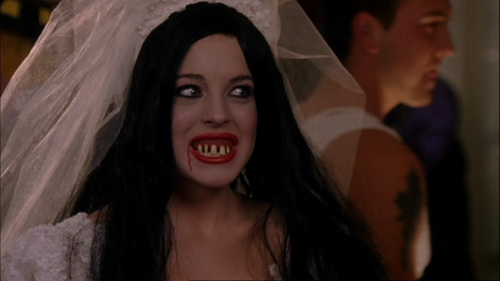 When Aaron and Cady talk about her Halloween costume at a party, she tells him that she is dressed up as: