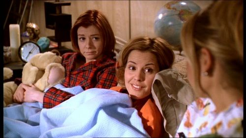  In 'Goodbye Iowa' what cartoon are Willow, Buffy, and Anya watching in Xander's basement?