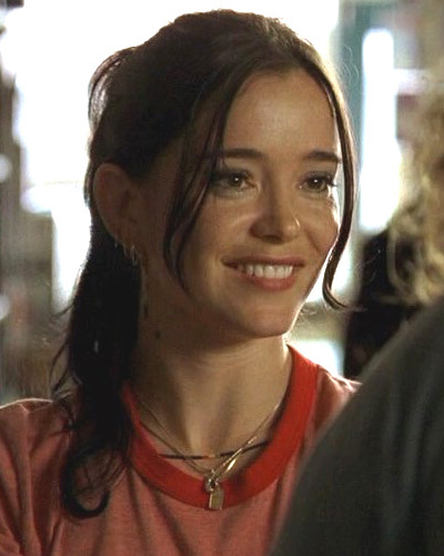 What was the name of the girl working in the music shop that Hurley had a crush on?