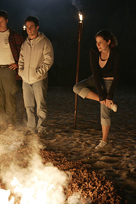 what does pam tell jim her feet are after walking through the fire pit?