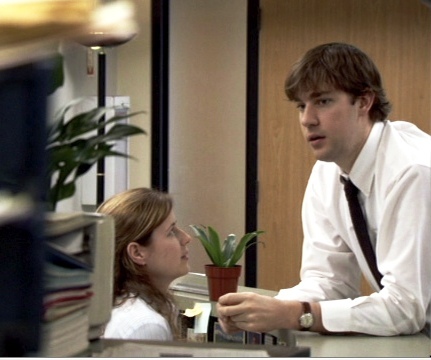  What are Pam and Jim talking about the first time we see them together in 'The Pilot'?