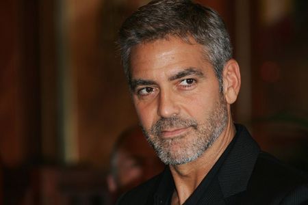  What movie stars George Clooney in a role previously played oleh Frank Sinatra?