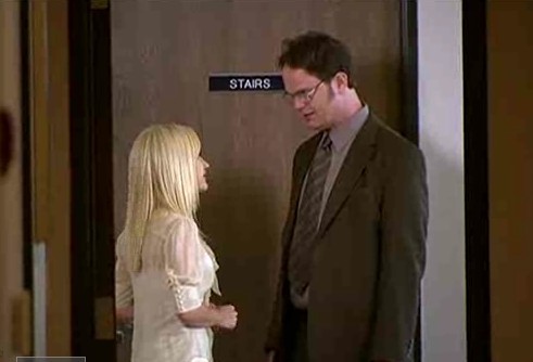 When Dwight tells Angela that Sprinkles died, what other news does he give her?