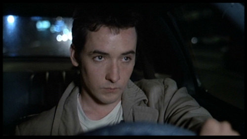  In Say Anything, what song does Lloyd play to win back his girlfriend?