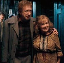  Who held the position of caretaker when Arthur and Molly Weasley were at Hogwarts?