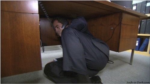 In which episode does Michael crawl under HIS desk?