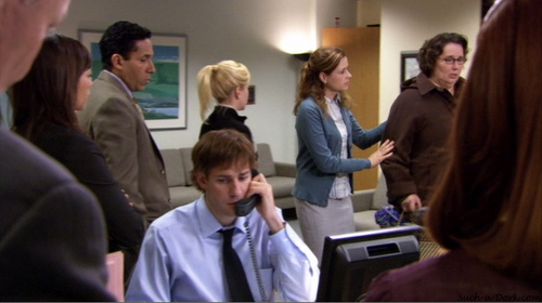  After Phyllis gets flashed, Dwight runs to the parking lot and Jim calls the police...what does Andy do to help?