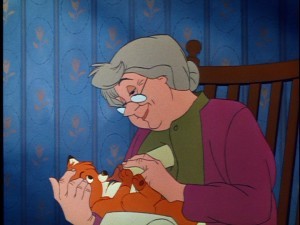 What is the name of the old woman who takes care of Todd in The Fox and the Hound?