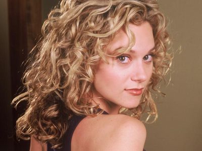 What is Hilarie's natural eye color?