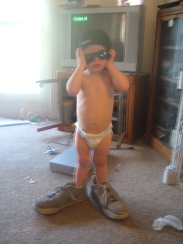  My son dressing up in Daddy's clothes