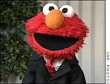  Elmo in a Suit