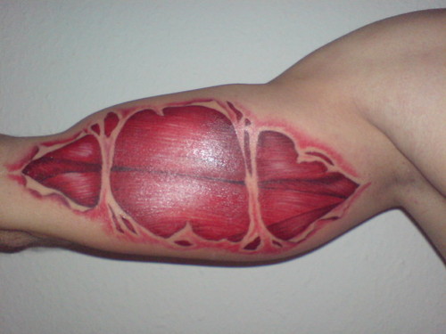  Cool mussle tattoo