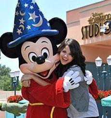 mileys freind (enemy) hugging mickey mouse